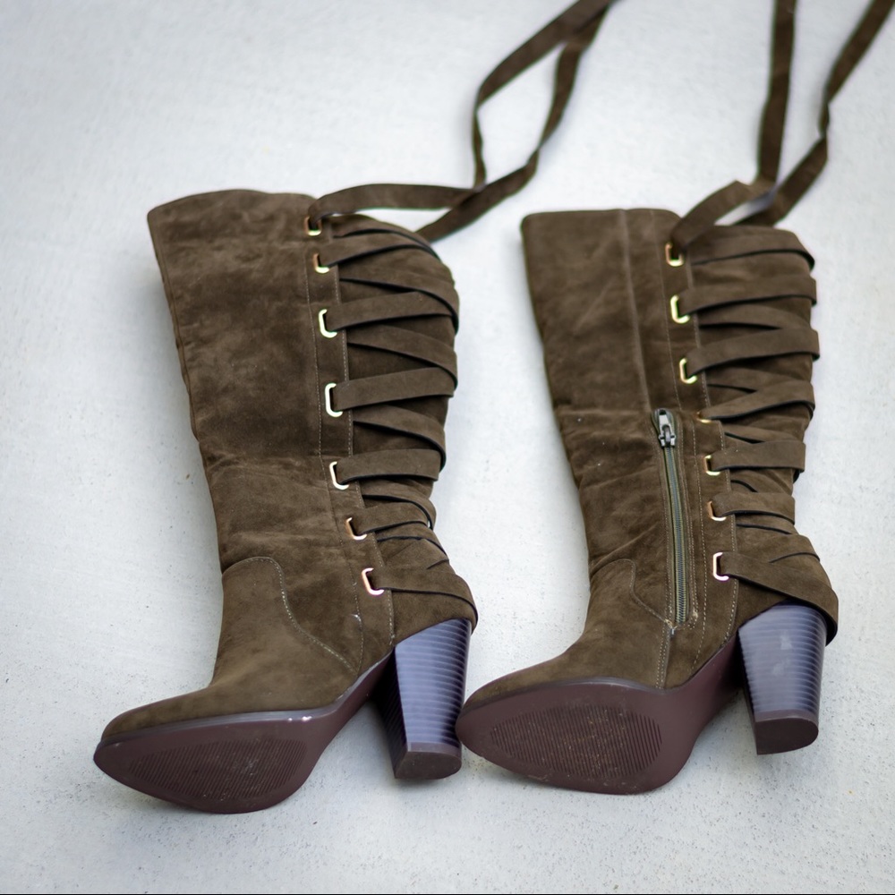 Olive green new in box heeled boots. Never worn